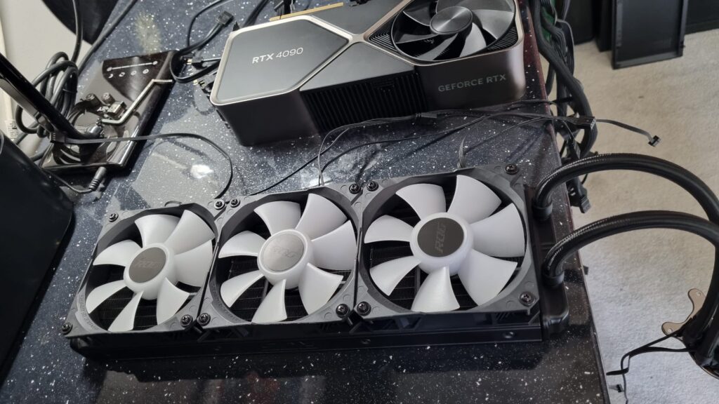 Triple fan water cooler for a Ryzen 9 processor keeping temps at a max of 80c! 